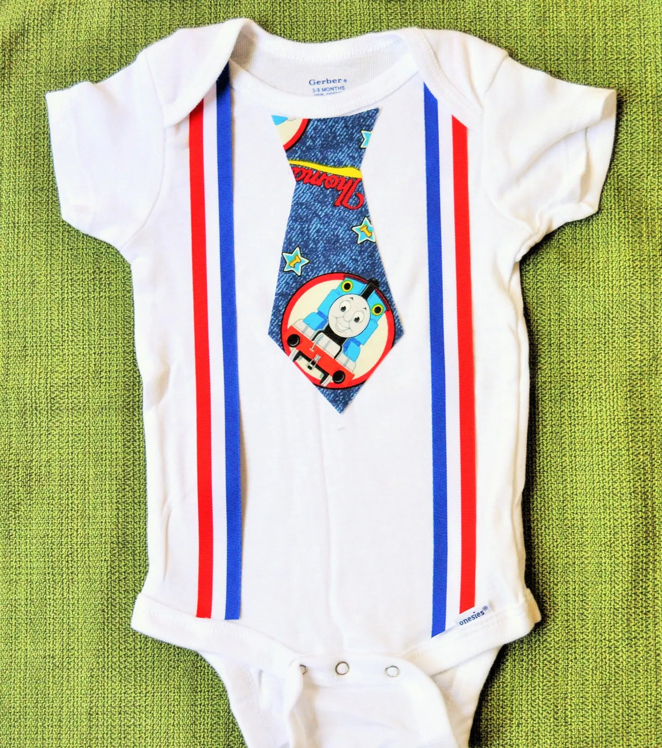 Thomas the Train Tie with red white and blue suspenders bodysuit or tShirt. Toddlers, cake smash, 4th of July, Memorial Day